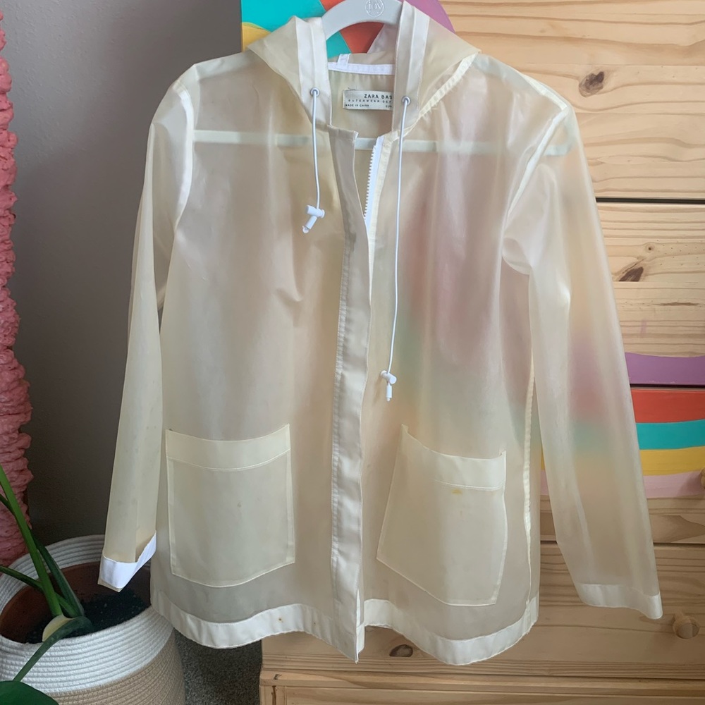 Zara clear raincoat with white trim